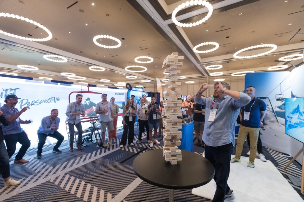 Hugh Reynolds from Snow Partners winning at Jenga. 